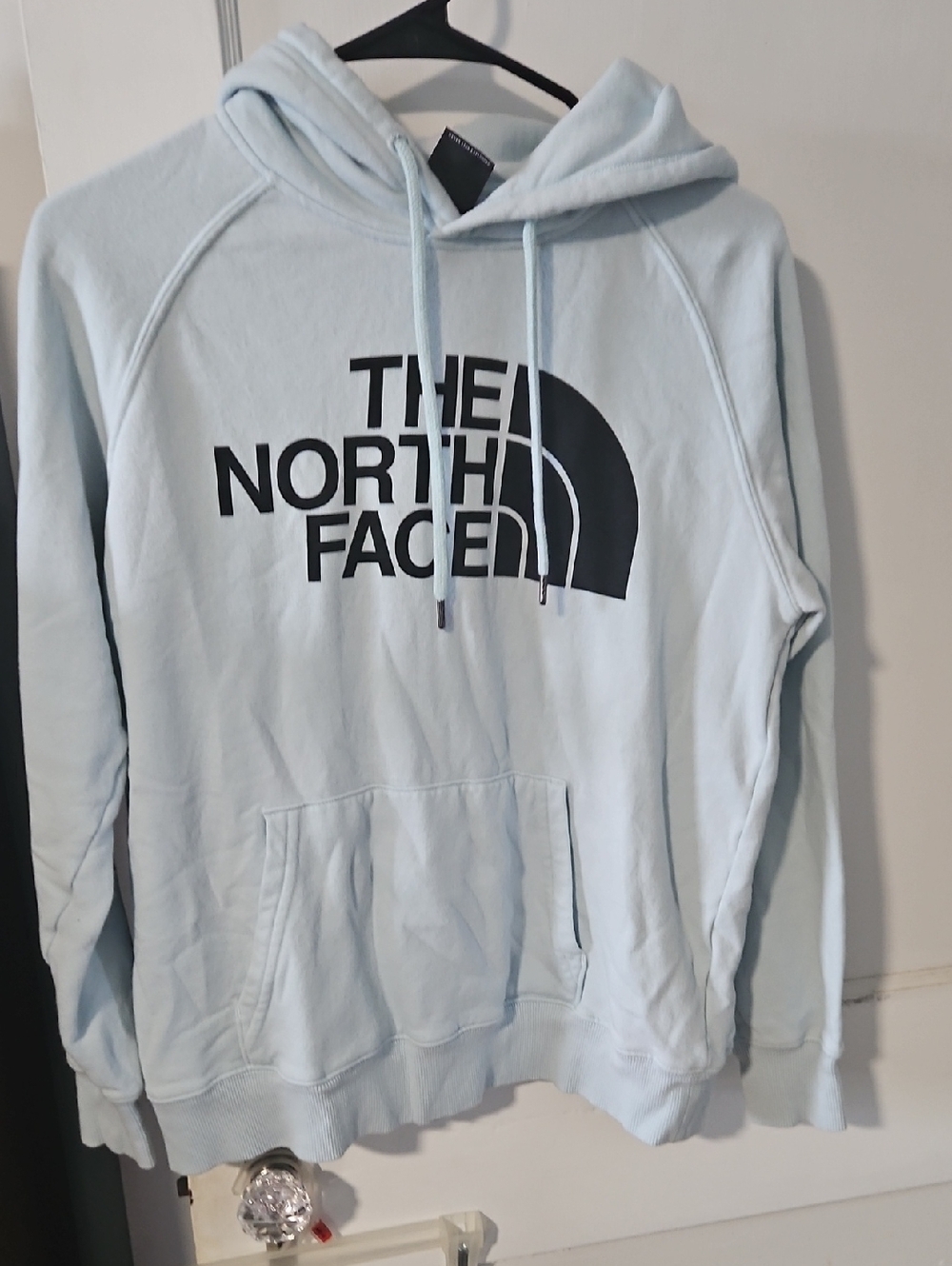 The North Face Women’s Light Blue Crewneck Hoodie with Black Logo